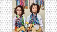 Os irmãos Heitor e Samuel Oliveira, de 7 e 8 anos, respectivamente: dedicação ao esporte com maturidade incomum para a idade. - Foto: Acervo da família
