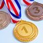 Três medalhas - ouro, prata e bronze